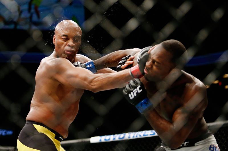 NEW YORK, NY - FEBRUARY 11: Derek Brunson (R) of United States lands a punch against Anderson Silva (L) of Brazil in their middleweight bout during UFC 208 at the Barclays Center on February 11, 2017 in the Brooklyn Borough of New York City. Anthony Geathers/Getty Images/AFP== FOR NEWSPAPERS, INTERNET, TELCOS & TELEVISION USE ONLY ==